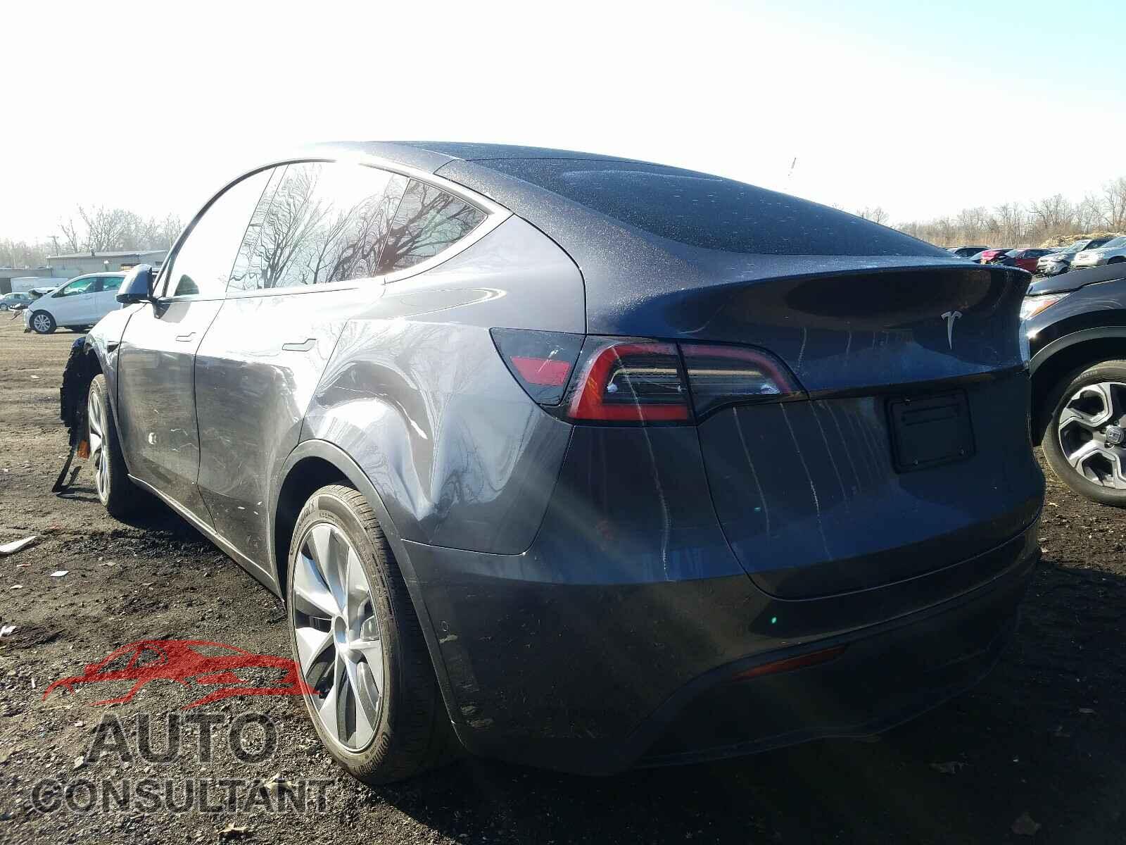TESLA MODEL Y 2021 - 5YJYGDED5MF106128