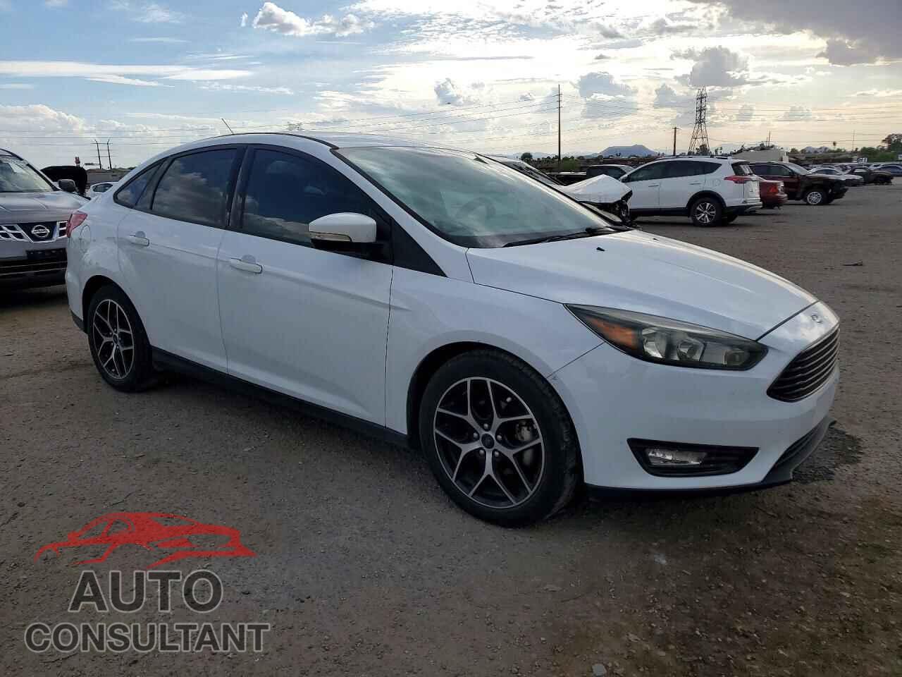 FORD FOCUS 2017 - 1FADP3FE7HL277617