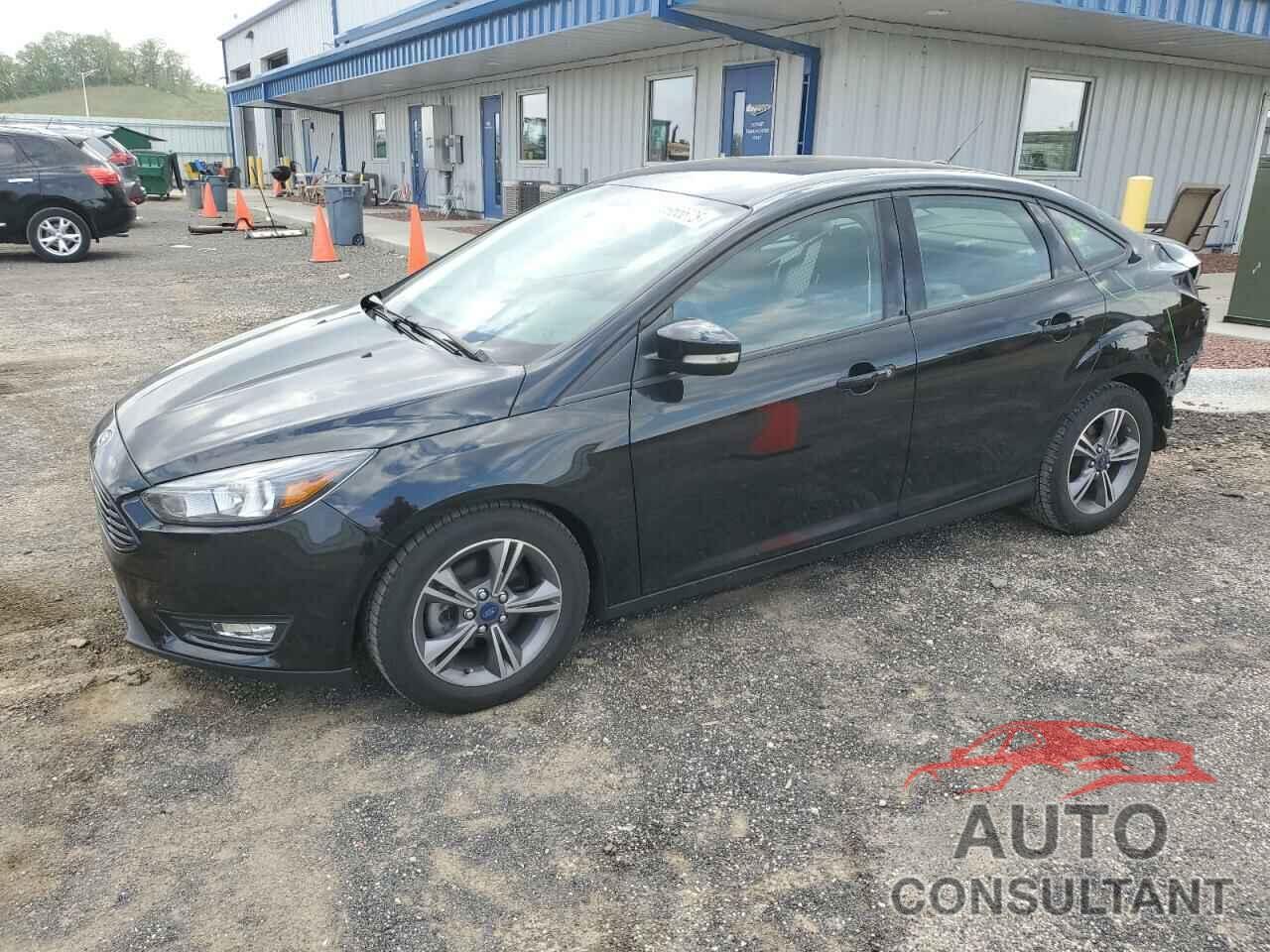 FORD FOCUS 2017 - 1FADP3FE9HL310360