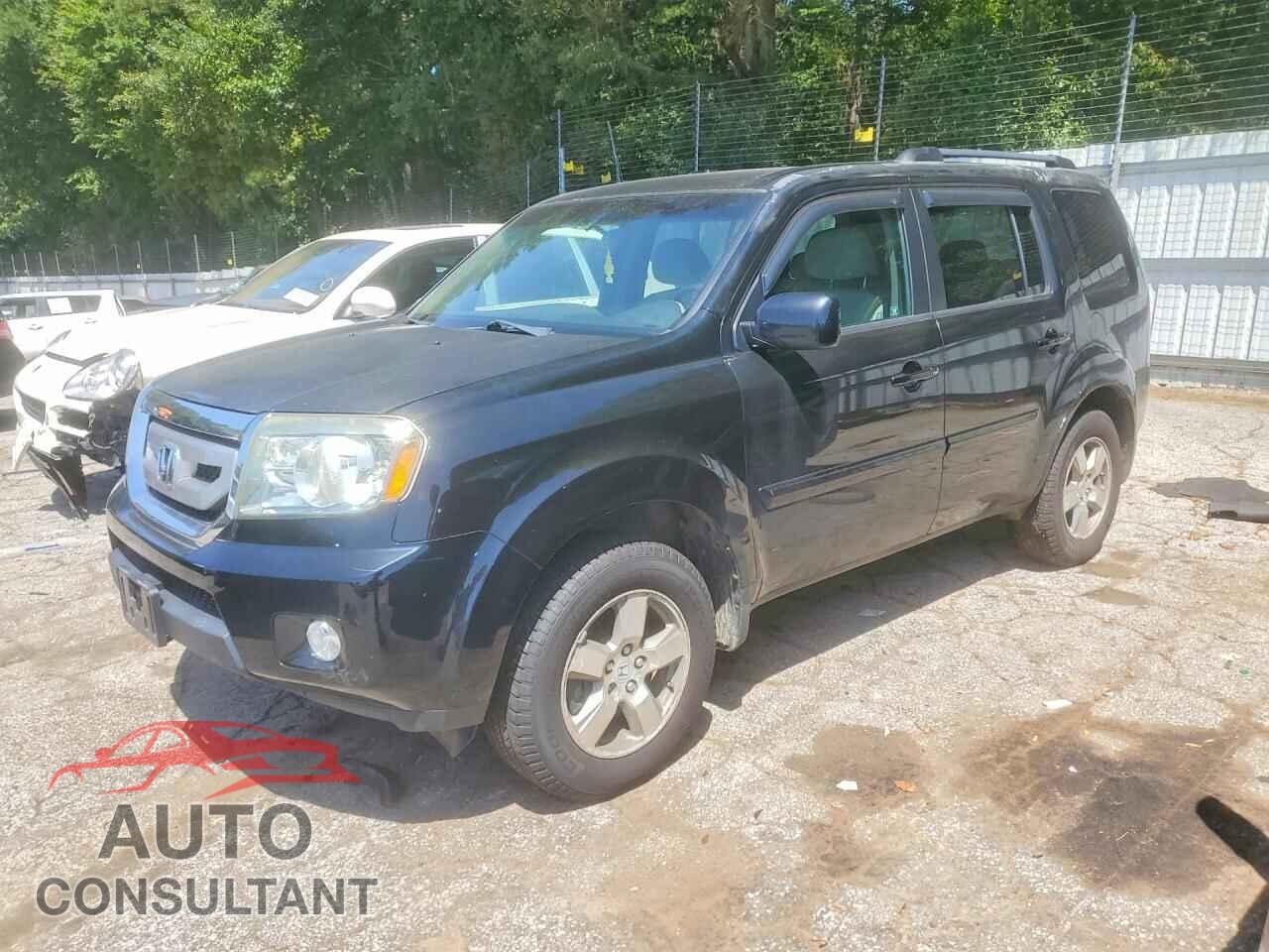 HONDA PILOT 2011 - 5FNYF4H4XBB028540
