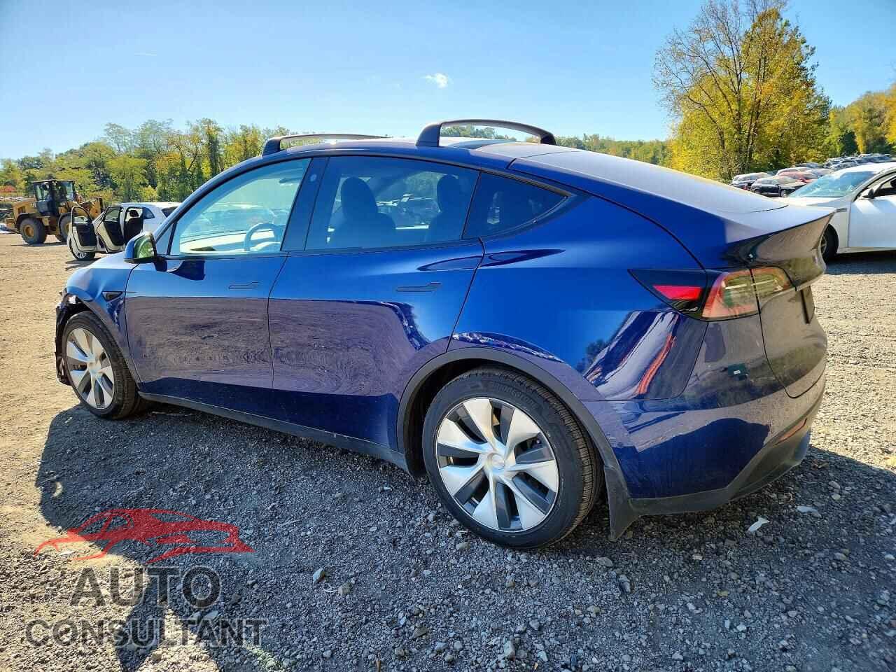 TESLA MODEL Y 2021 - 5YJYGAEE1MF148142