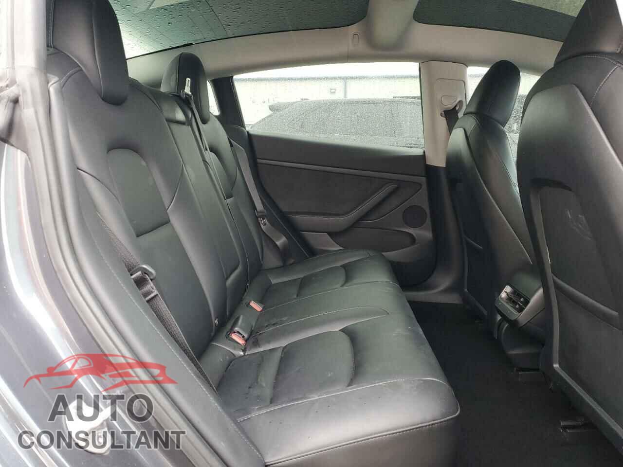 TESLA MODEL 3 2023 - 5YJ3E1EB4PF665395