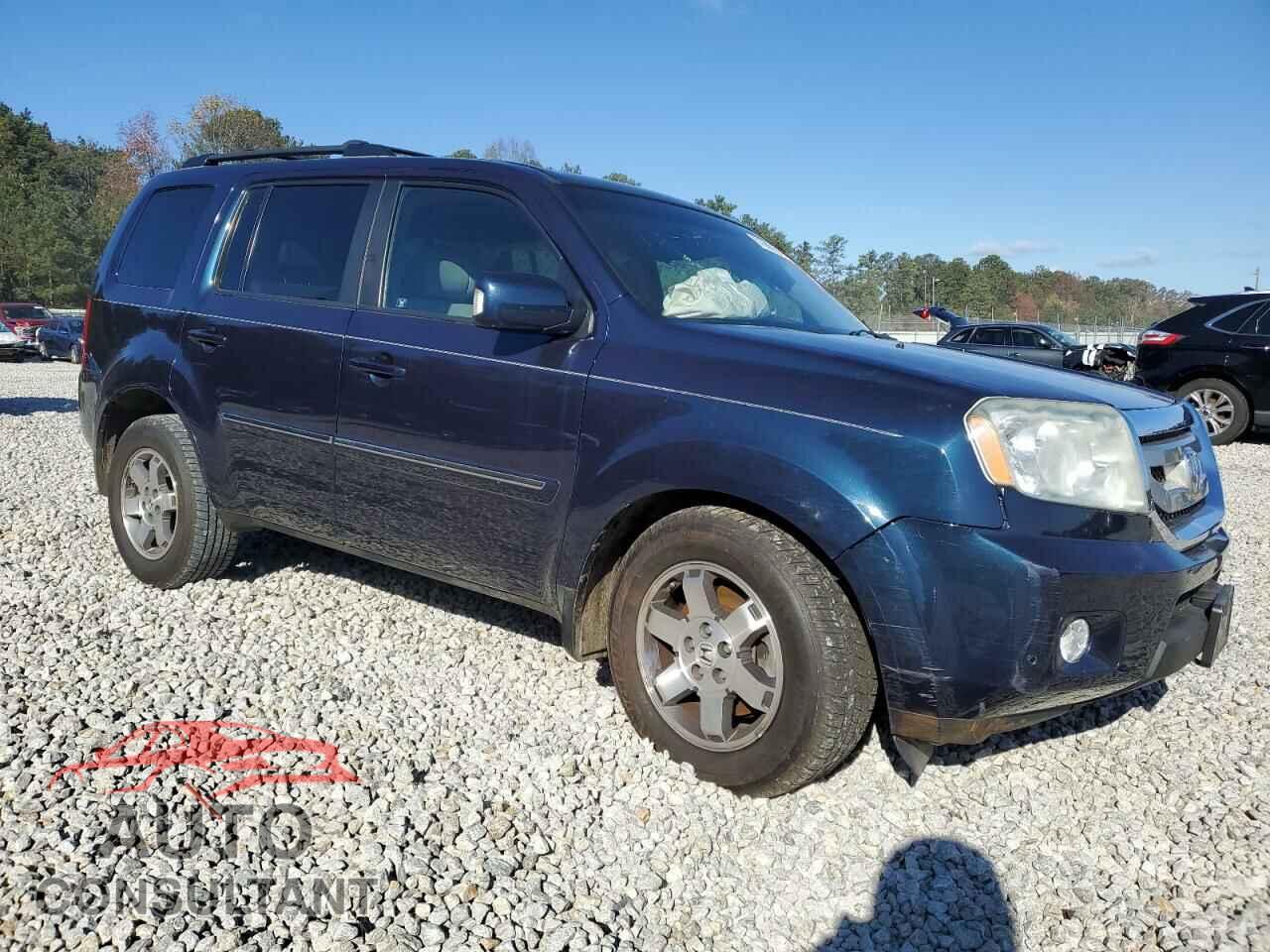HONDA PILOT 2011 - 5FNYF4H99BB040996
