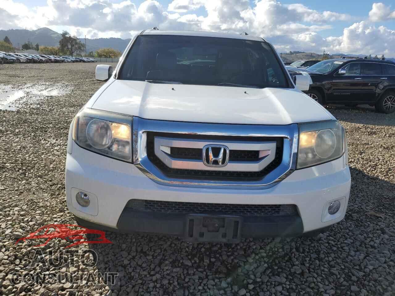 HONDA PILOT 2011 - 5FNYF3H57BB058422