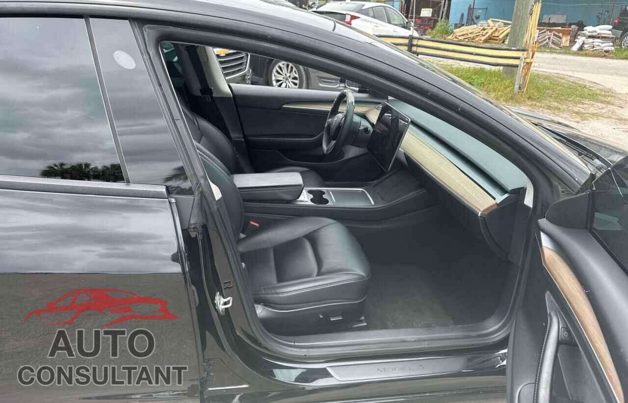 TESLA MODEL 3 2021 - 5YJ3E1EA9MF048657