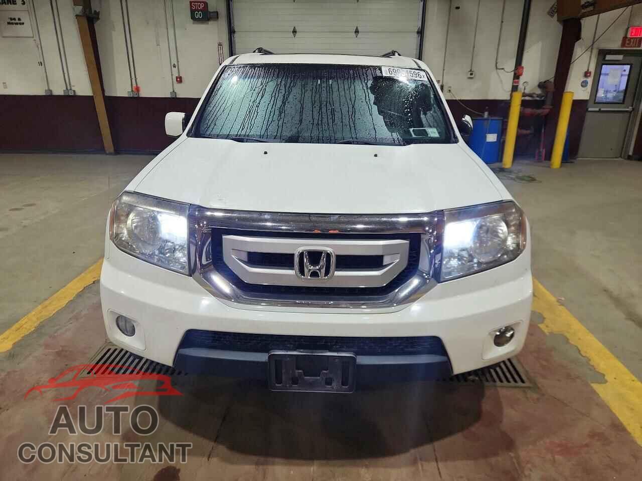 HONDA PILOT 2011 - 5FNYF4H52BB001373