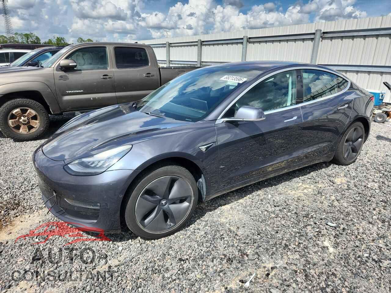 TESLA MODEL 3 2018 - 5YJ3E1EB4JF128551