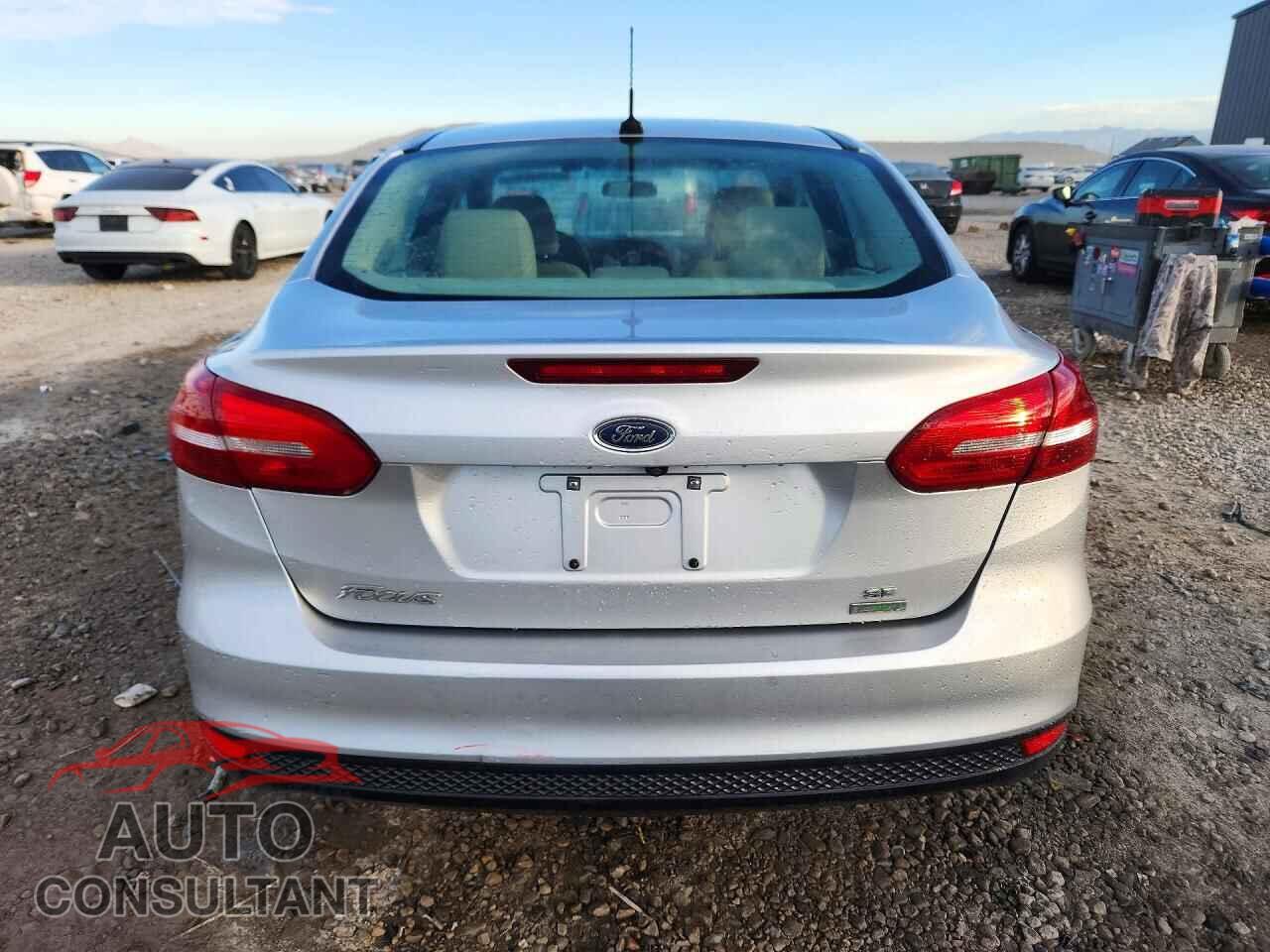 FORD FOCUS 2016 - 1FADP3FE9GL359587