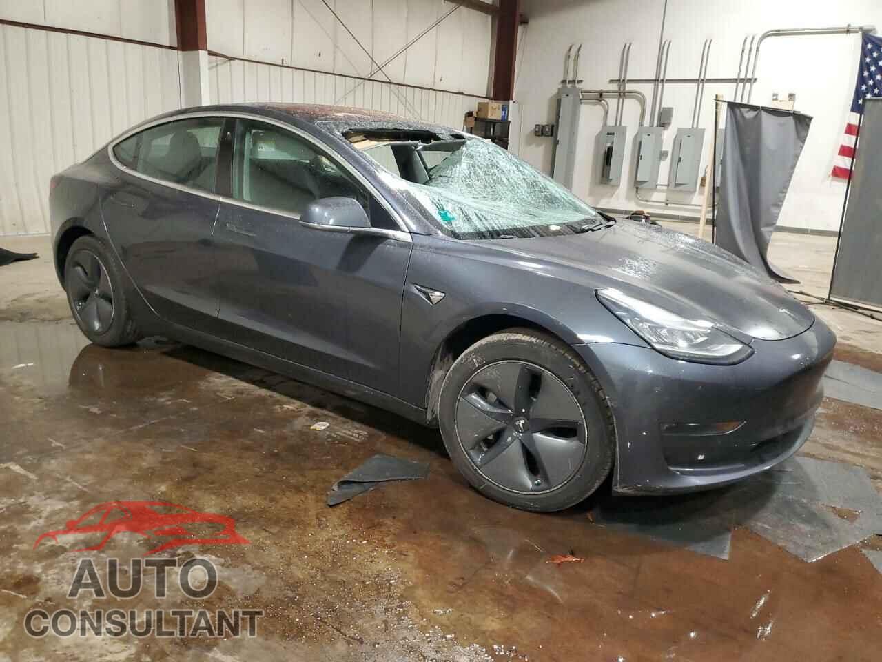 TESLA MODEL 3 2018 - 5YJ3E1EA0JF003957