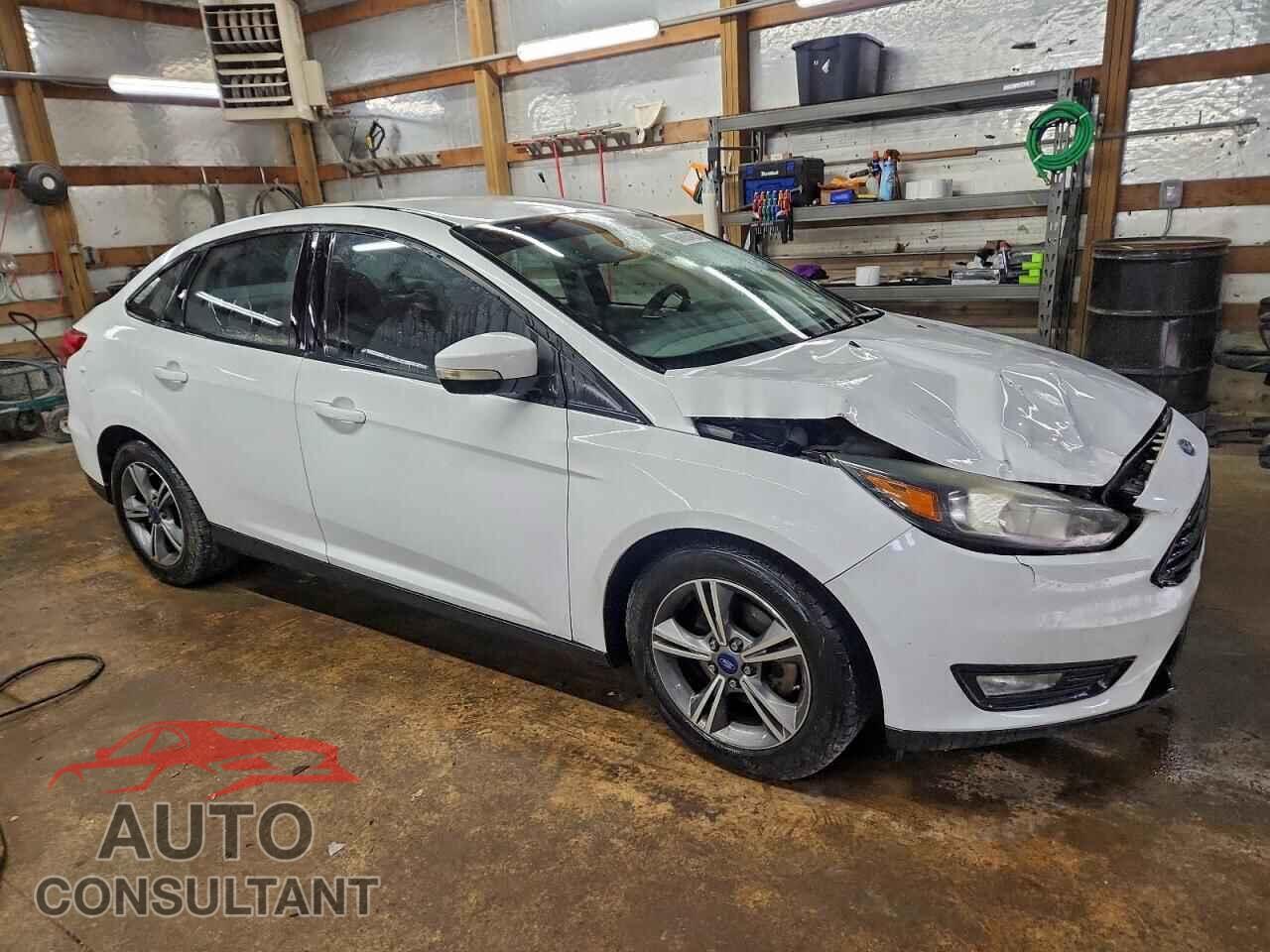 FORD FOCUS 2016 - 1FADP3FE3GL403096