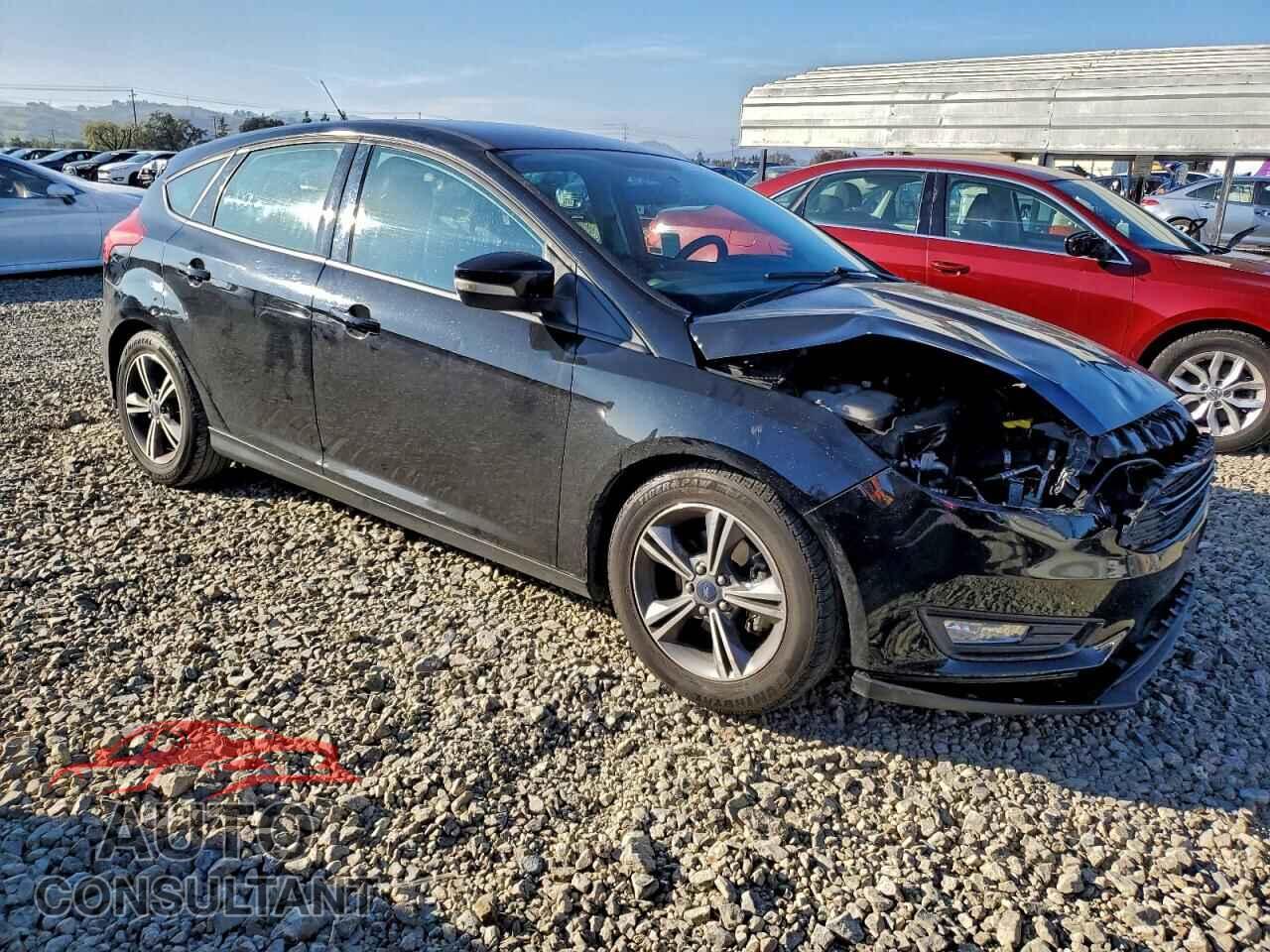 FORD FOCUS 2016 - 1FADP3KE9GL234644