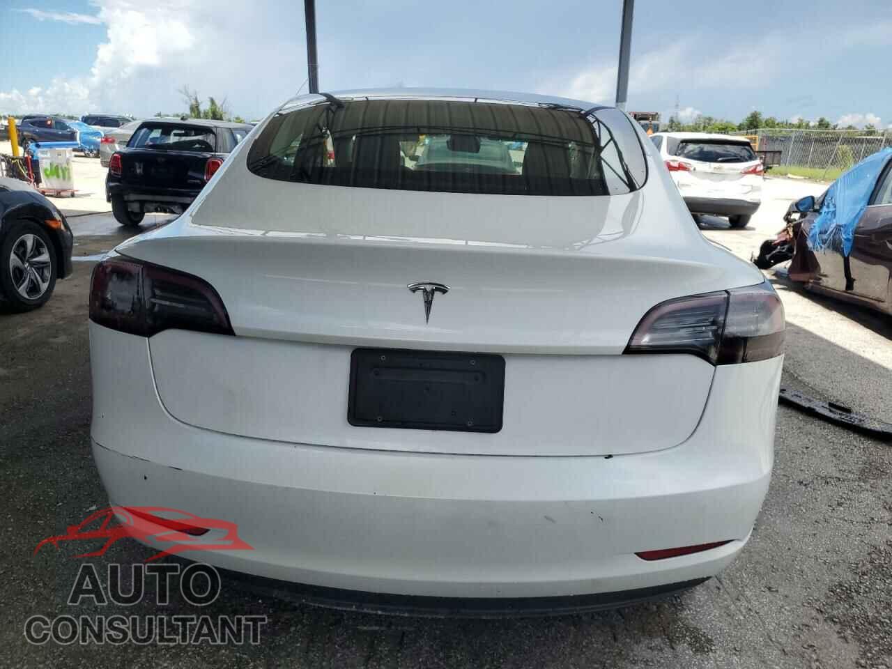 TESLA MODEL 3 2023 - 5YJ3E1EA0PF453083