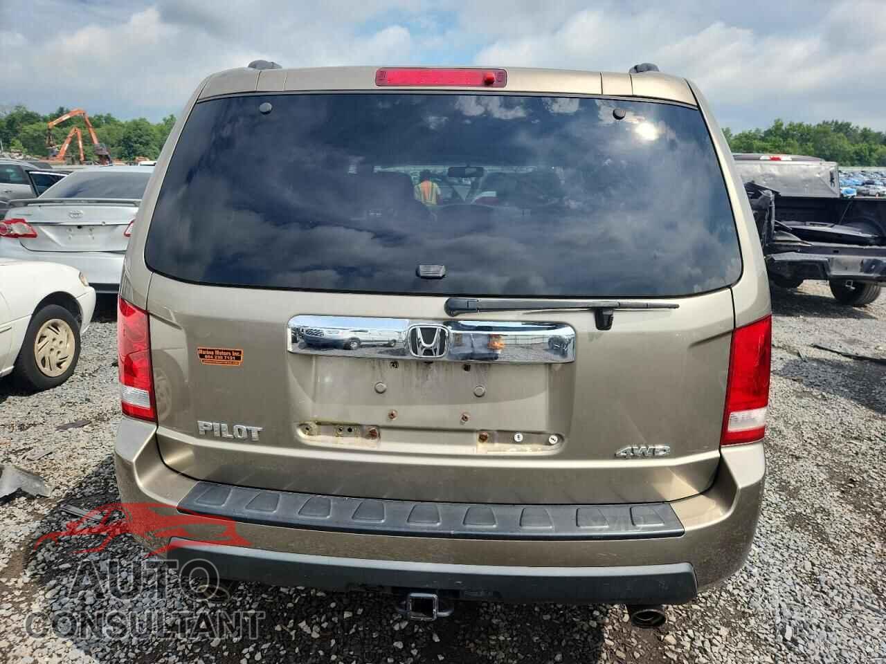 HONDA PILOT 2011 - 5FNYF4H64BB030950