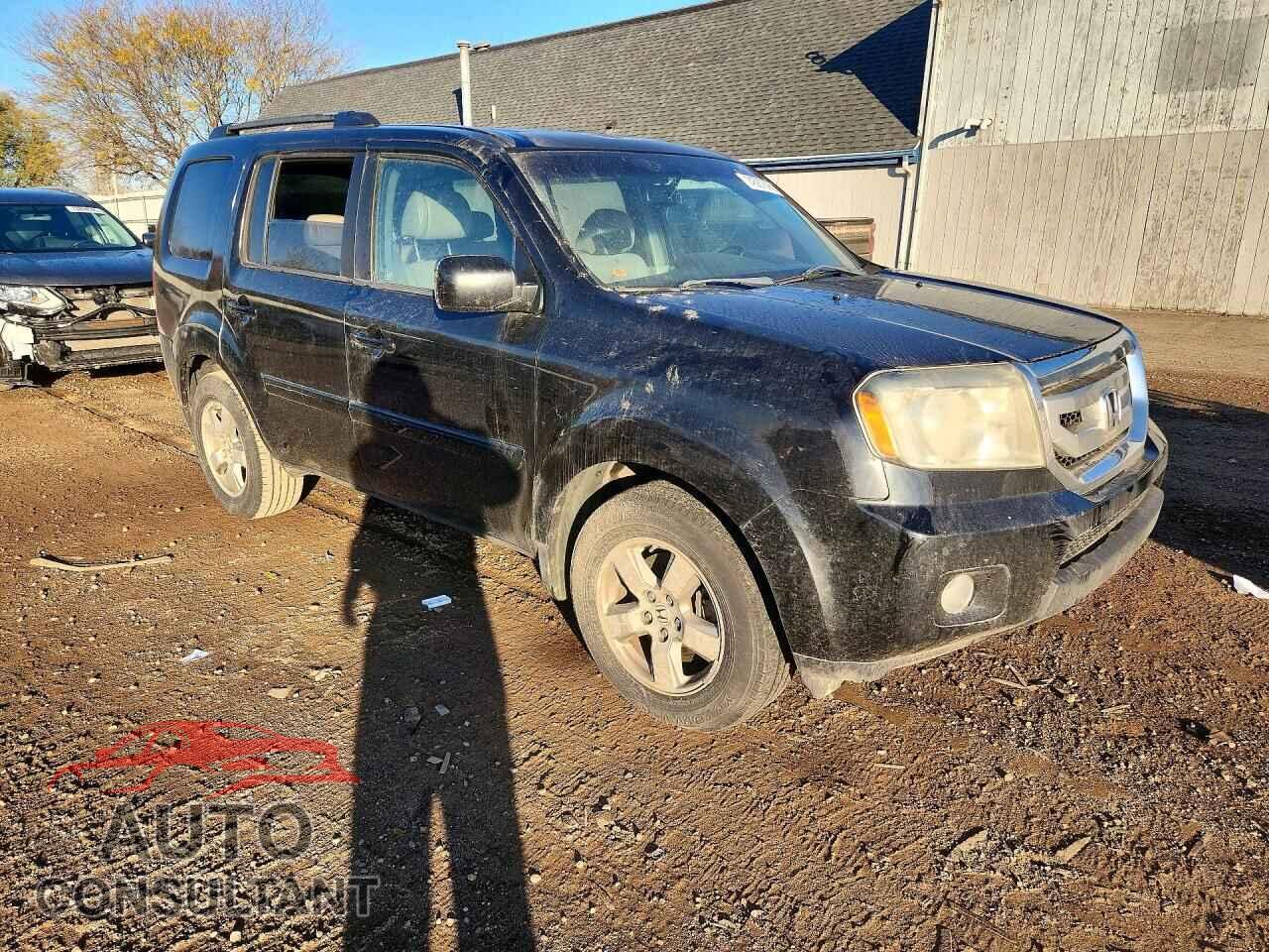 HONDA PILOT 2011 - 5FNYF4H77BB018980