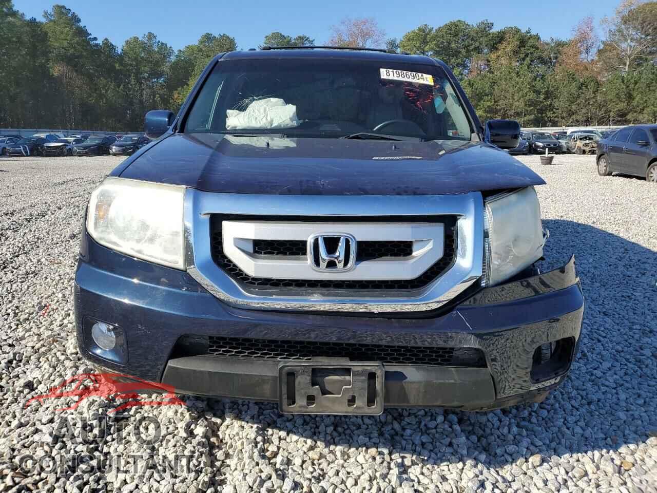 HONDA PILOT 2011 - 5FNYF4H99BB040996