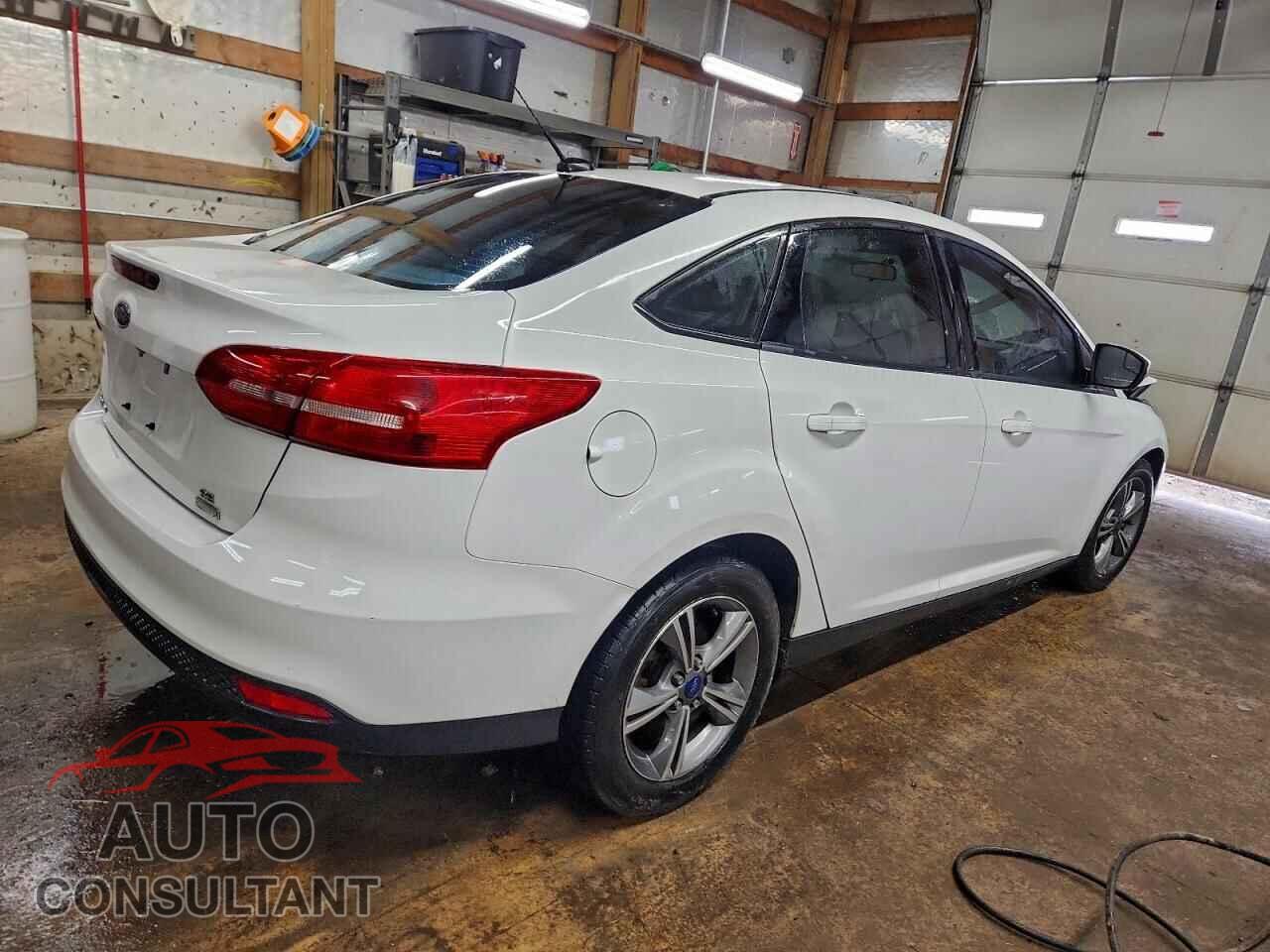 FORD FOCUS 2016 - 1FADP3FE3GL403096