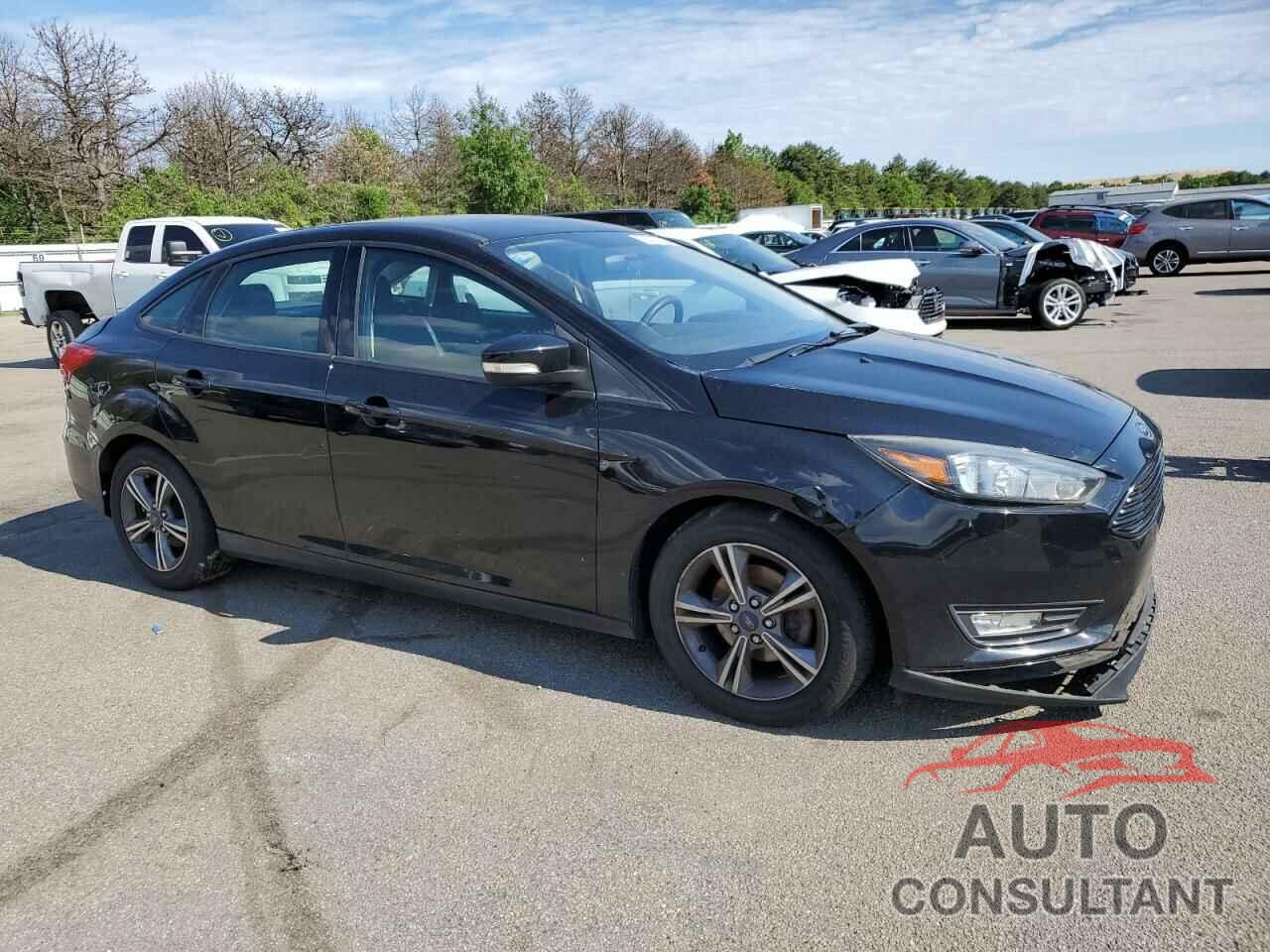 FORD FOCUS 2016 - 1FADP3FE9GL298418