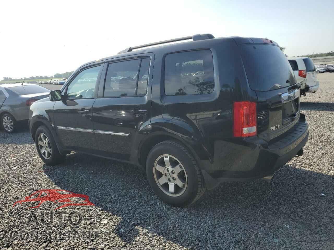 HONDA PILOT 2011 - 5FNYF3H93BB045380