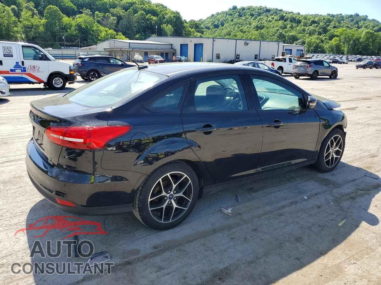 FORD FOCUS 2018 - 1FADP3FE4JL309977