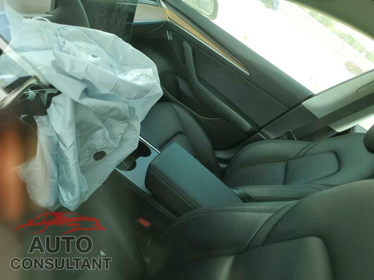 TESLA MODEL 3 2021 - 5YJ3E1EC9MF062611