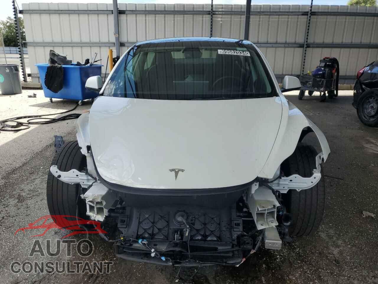 TESLA MODEL 3 2023 - 5YJ3E1EA0PF453083