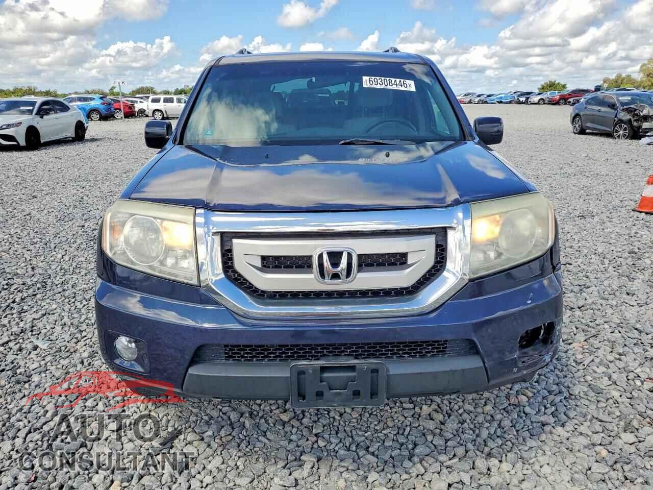 HONDA PILOT 2011 - 5FNYF4H44BB103054
