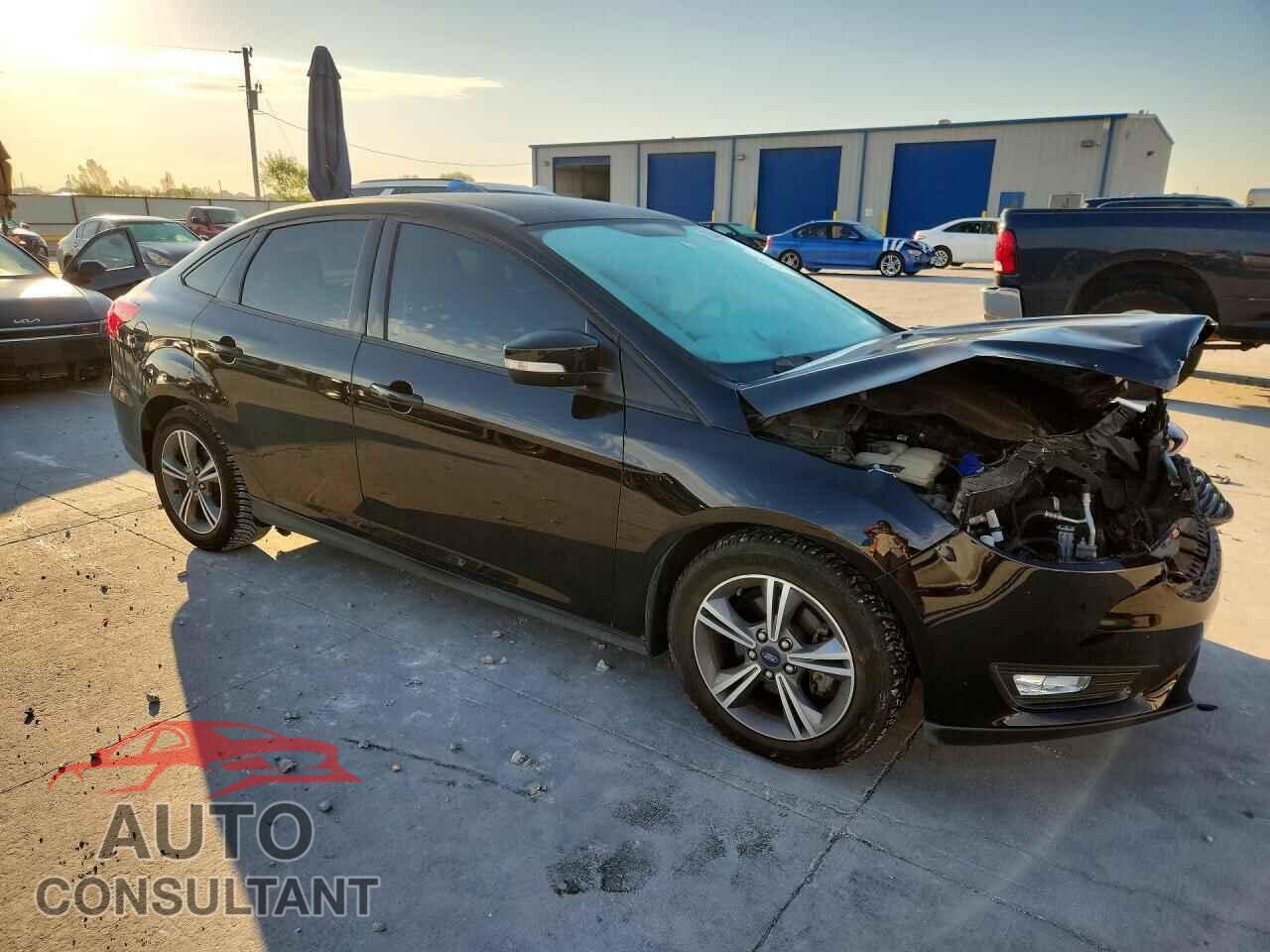 FORD FOCUS 2017 - 1FADP3FE7HL328470