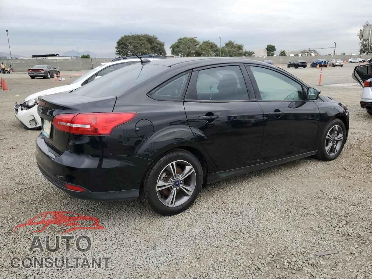 FORD FOCUS 2016 - 1FADP3FE0GL225745