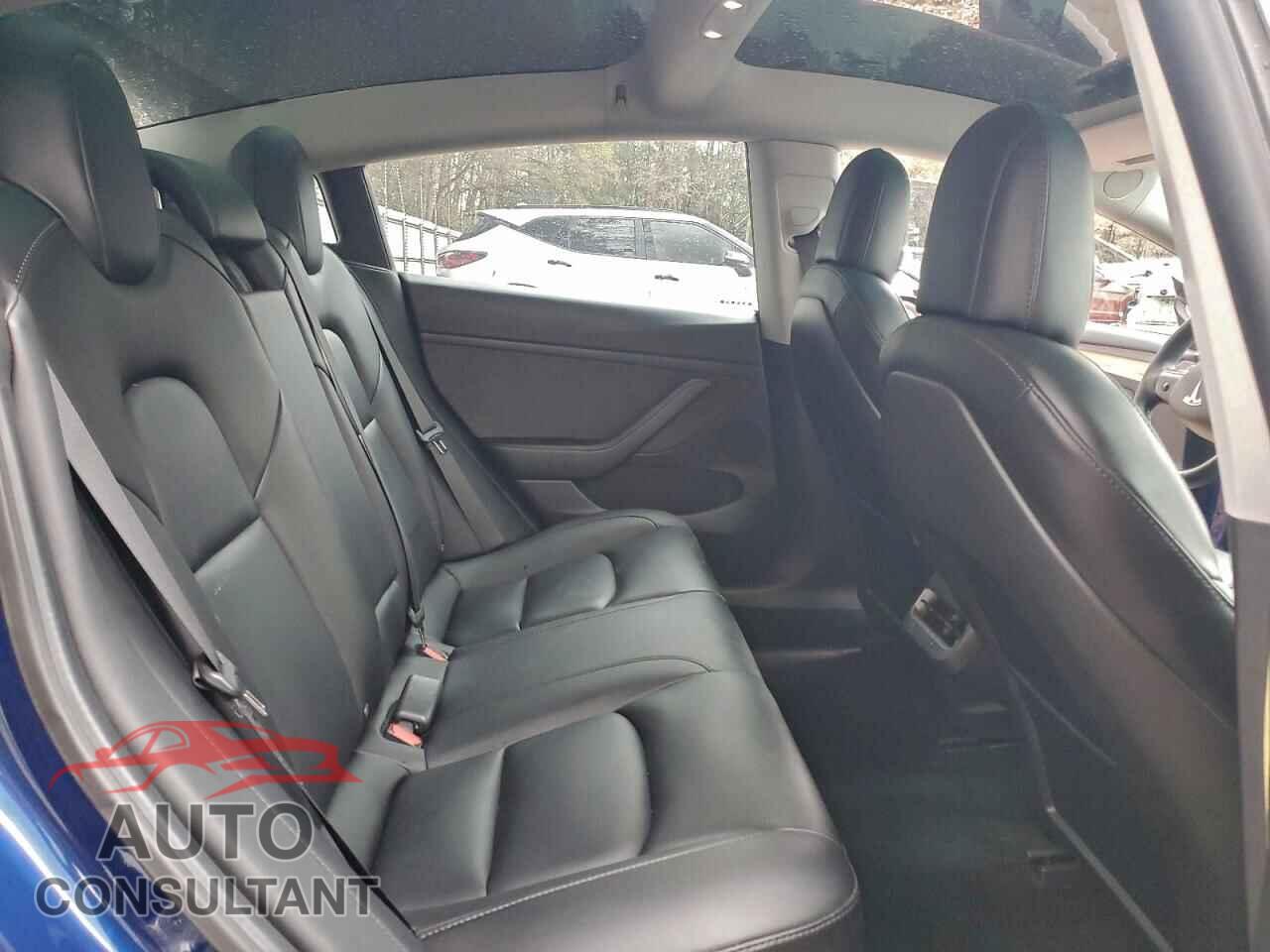 TESLA MODEL 3 2021 - 5YJ3E1EAXMF031186