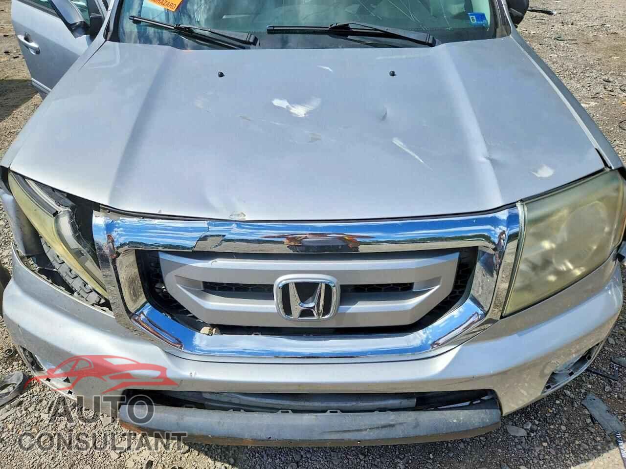 HONDA PILOT 2011 - 5FNYF4H59BB038890