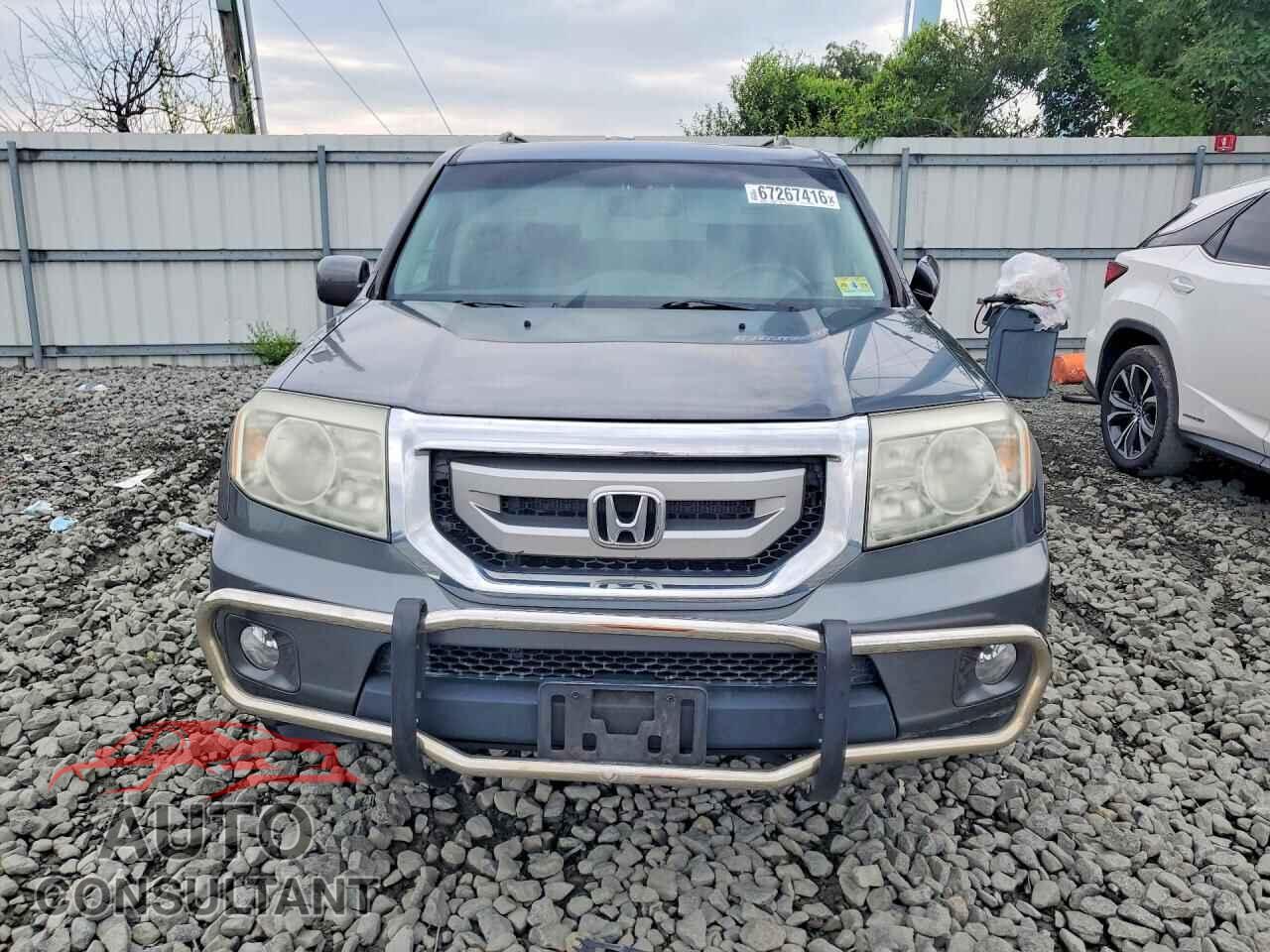 HONDA PILOT 2011 - 5FNYF4H93BB064968