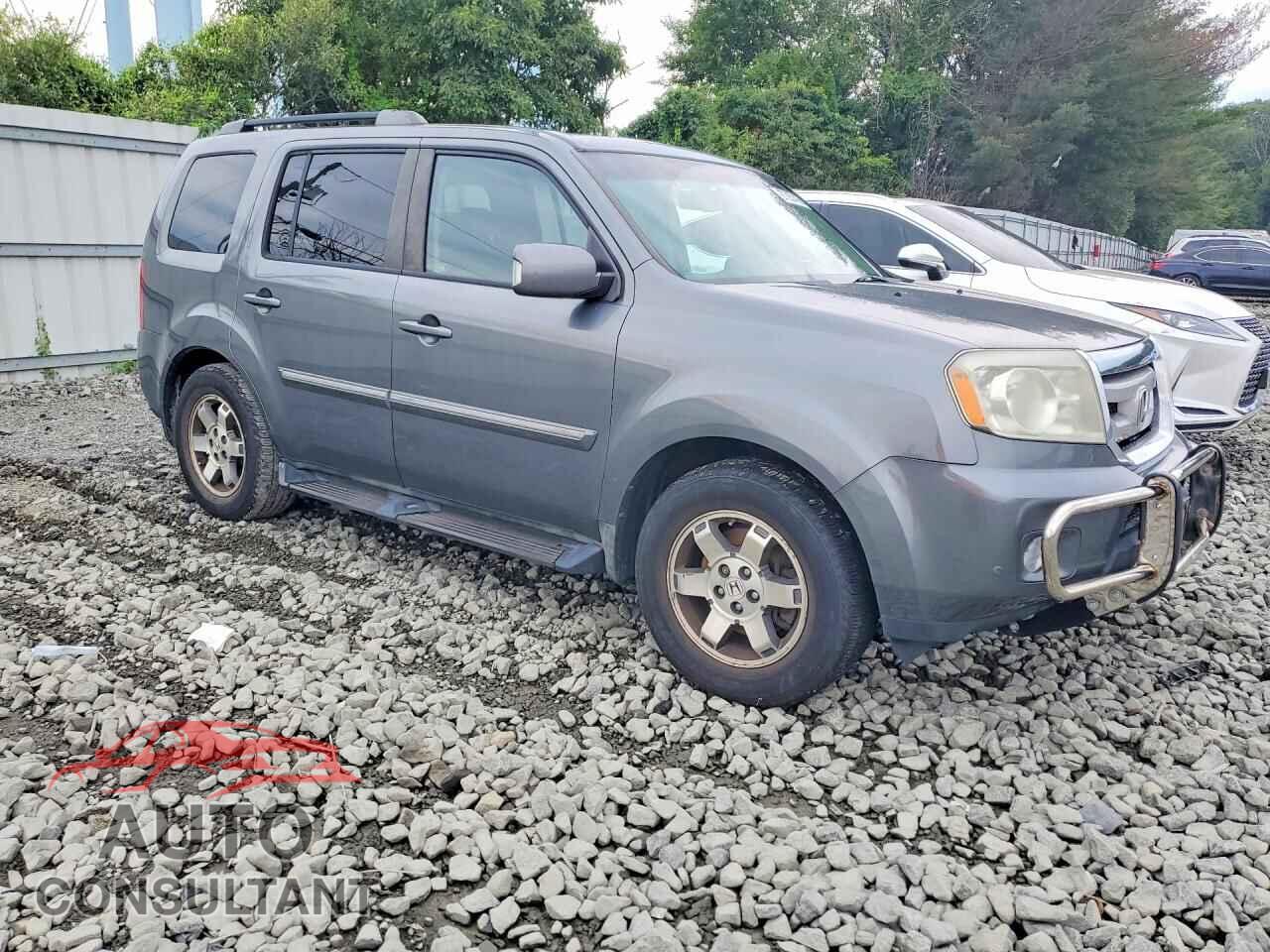 HONDA PILOT 2011 - 5FNYF4H93BB064968
