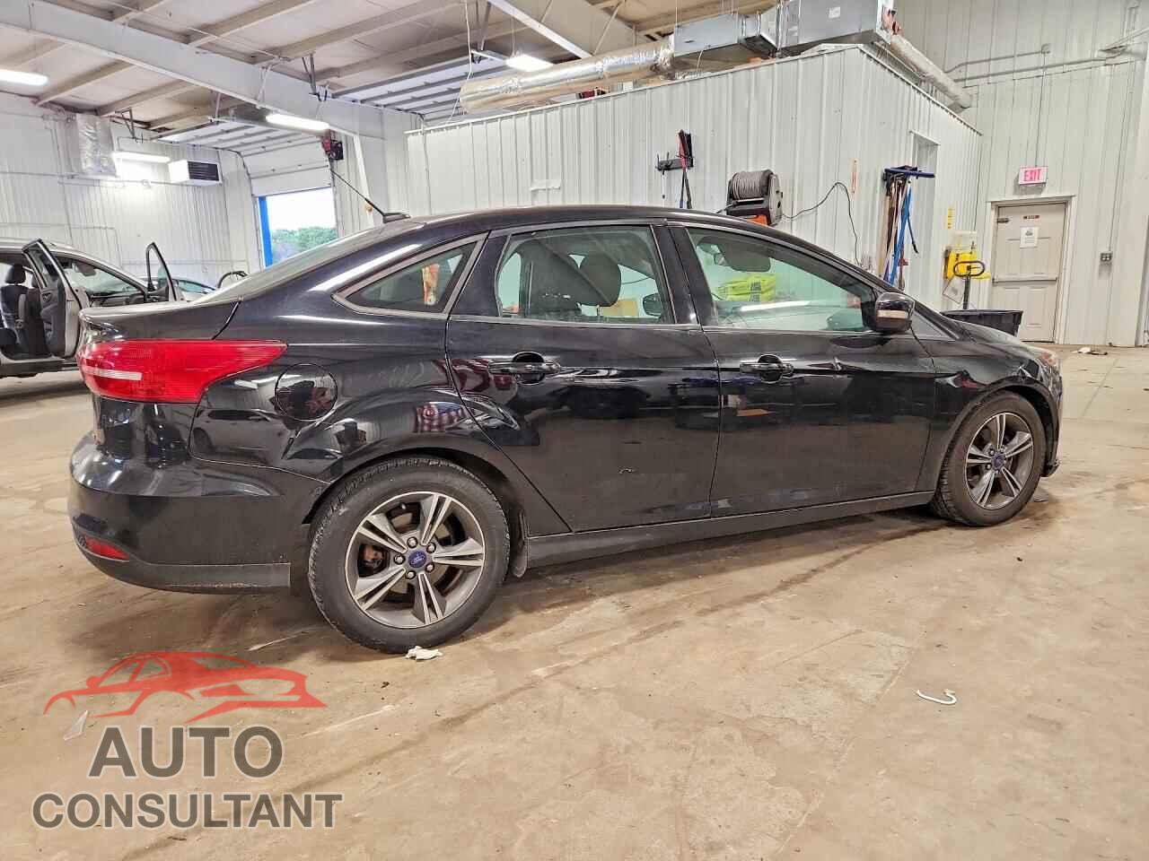 FORD FOCUS 2016 - 1FADP3FE4GL246081