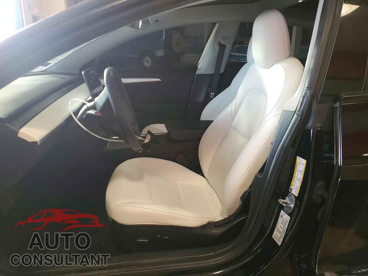 TESLA MODEL 3 2021 - 5YJ3E1EB0MF975345