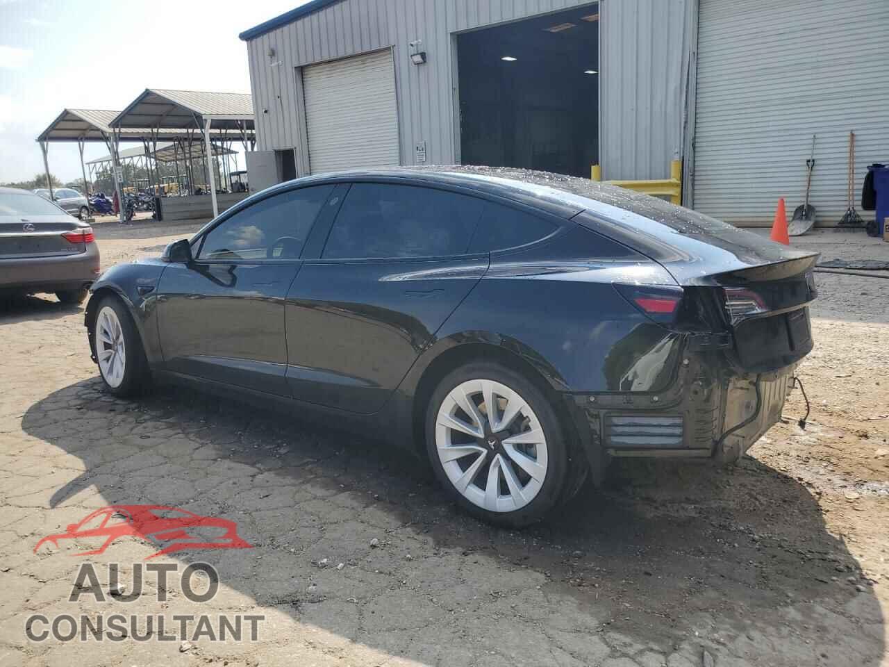 TESLA MODEL 3 2021 - 5YJ3E1EB2MF989988