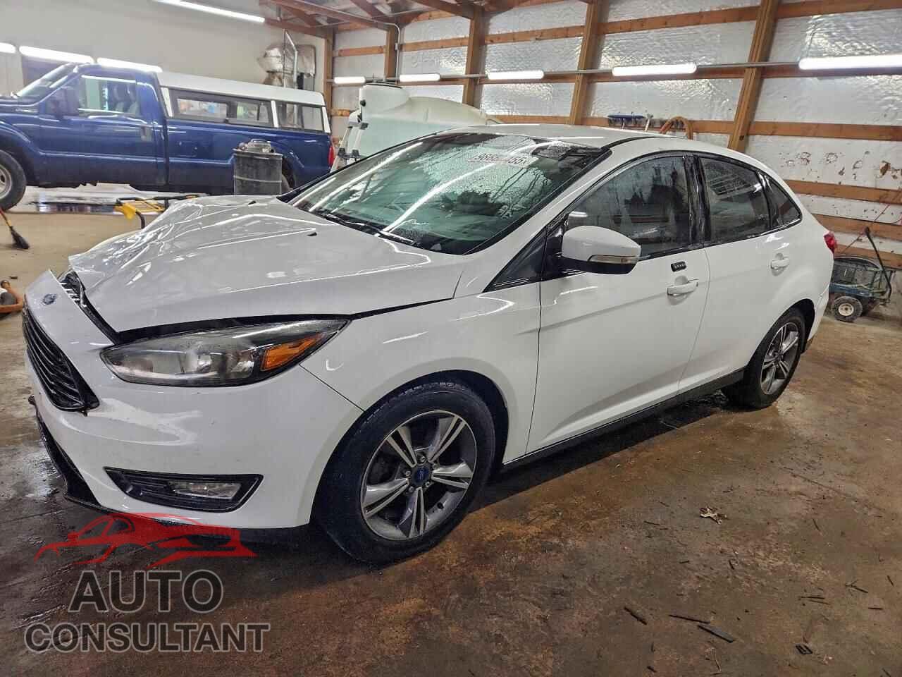FORD FOCUS 2016 - 1FADP3FE3GL403096