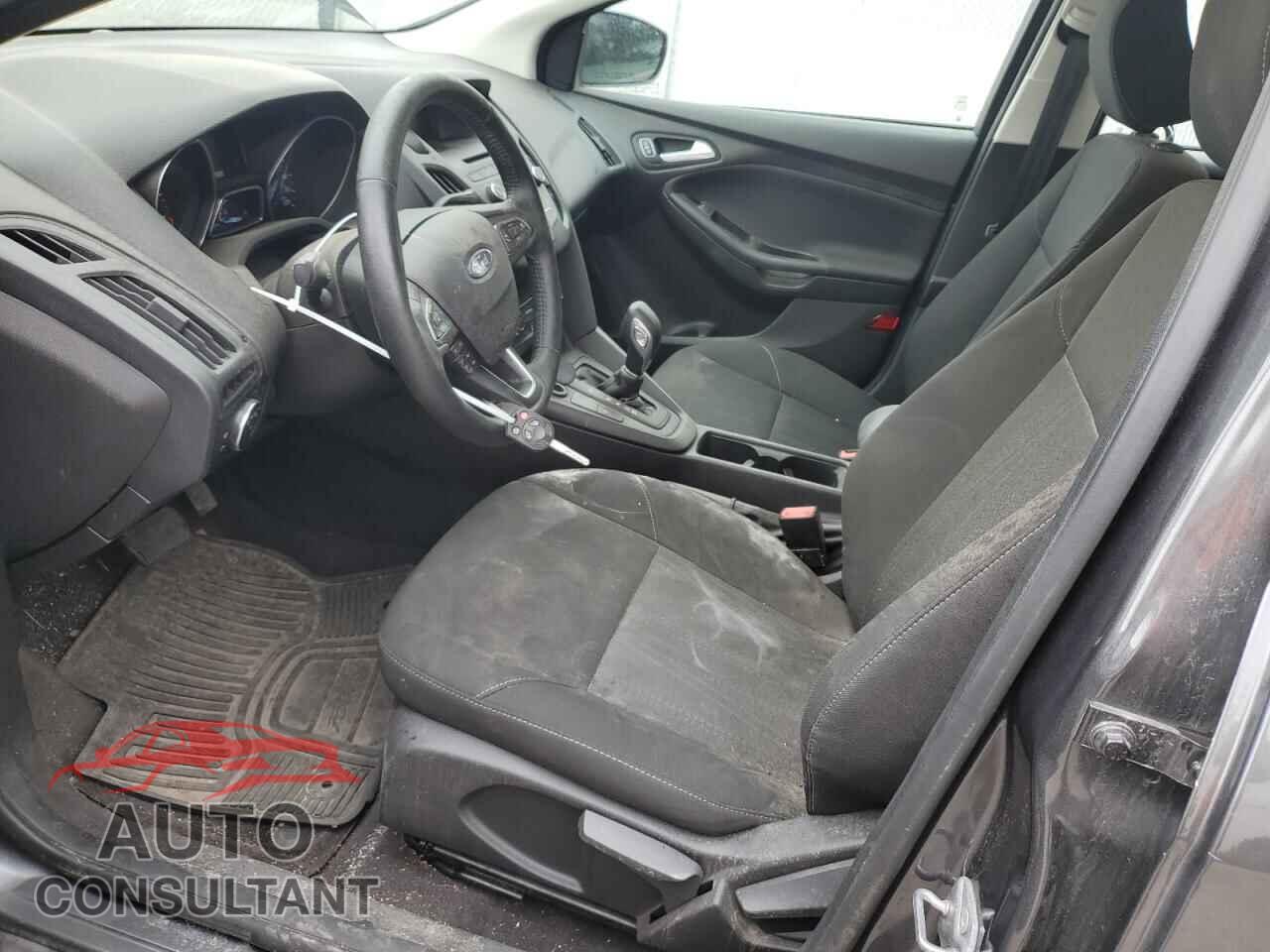 FORD FOCUS 2017 - 1FADP3FE5HL329858