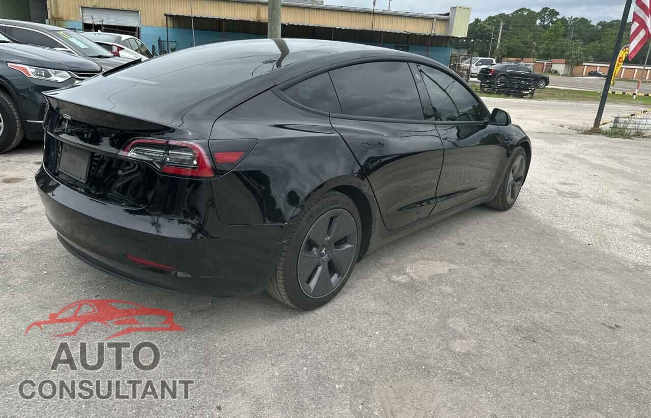 TESLA MODEL 3 2021 - 5YJ3E1EA9MF048657