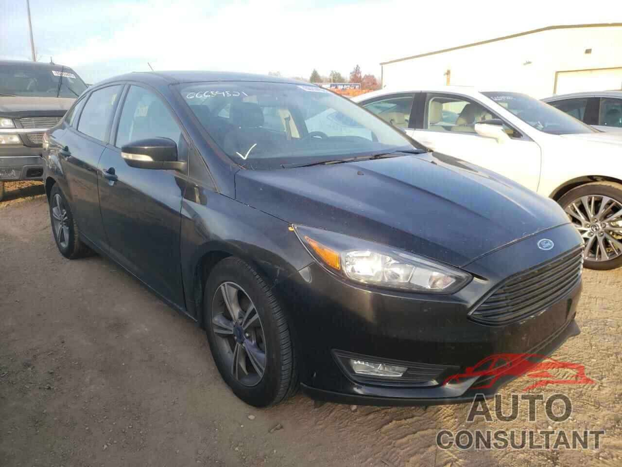 FORD FOCUS 2017 - 1FADP3FE9HL235319