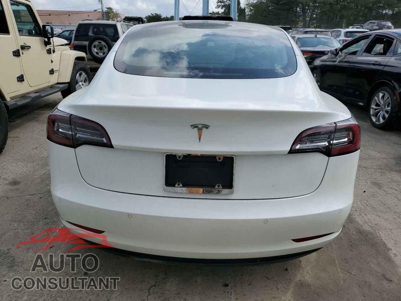 TESLA MODEL 3 2021 - 5YJ3E1EA5MF989085