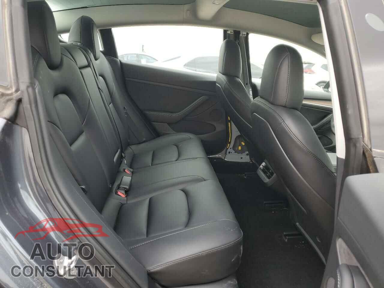 TESLA MODEL 3 2023 - 5YJ3E1EA0PF404580