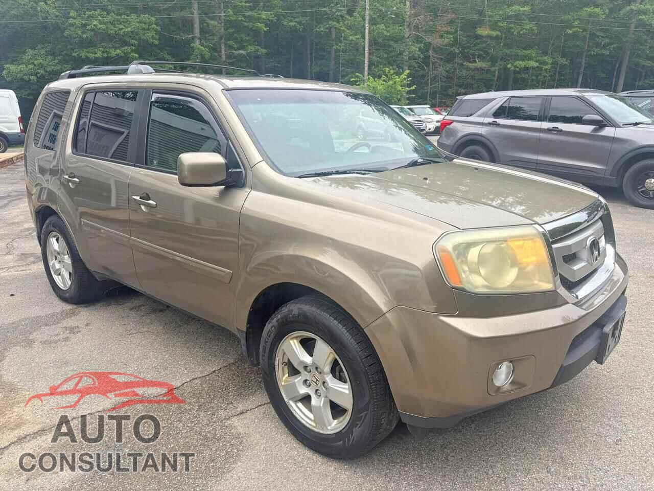 HONDA PILOT 2011 - 5FNYF4H57BB010649