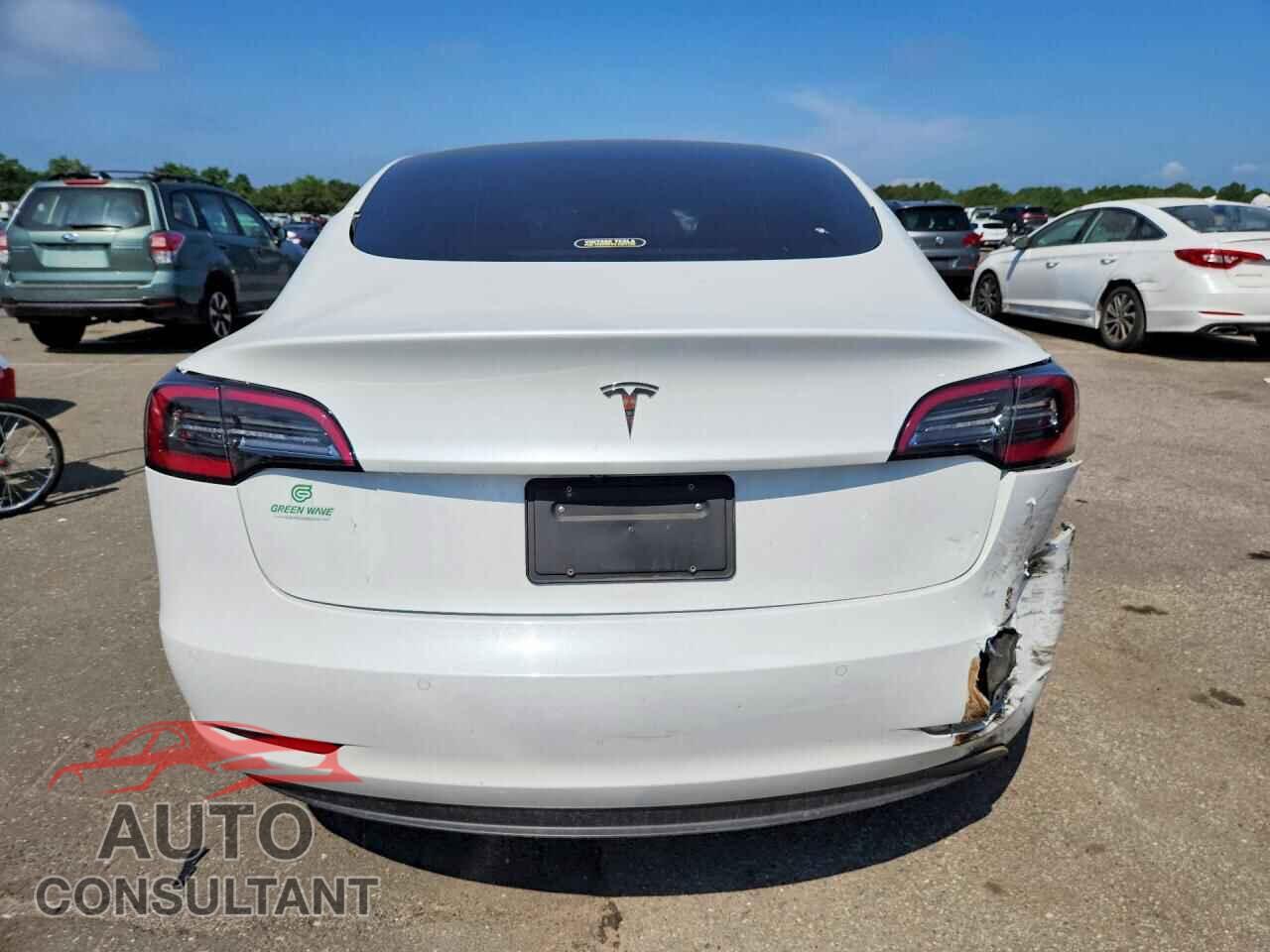 TESLA MODEL 3 2021 - 5YJ3E1EA0MF090103