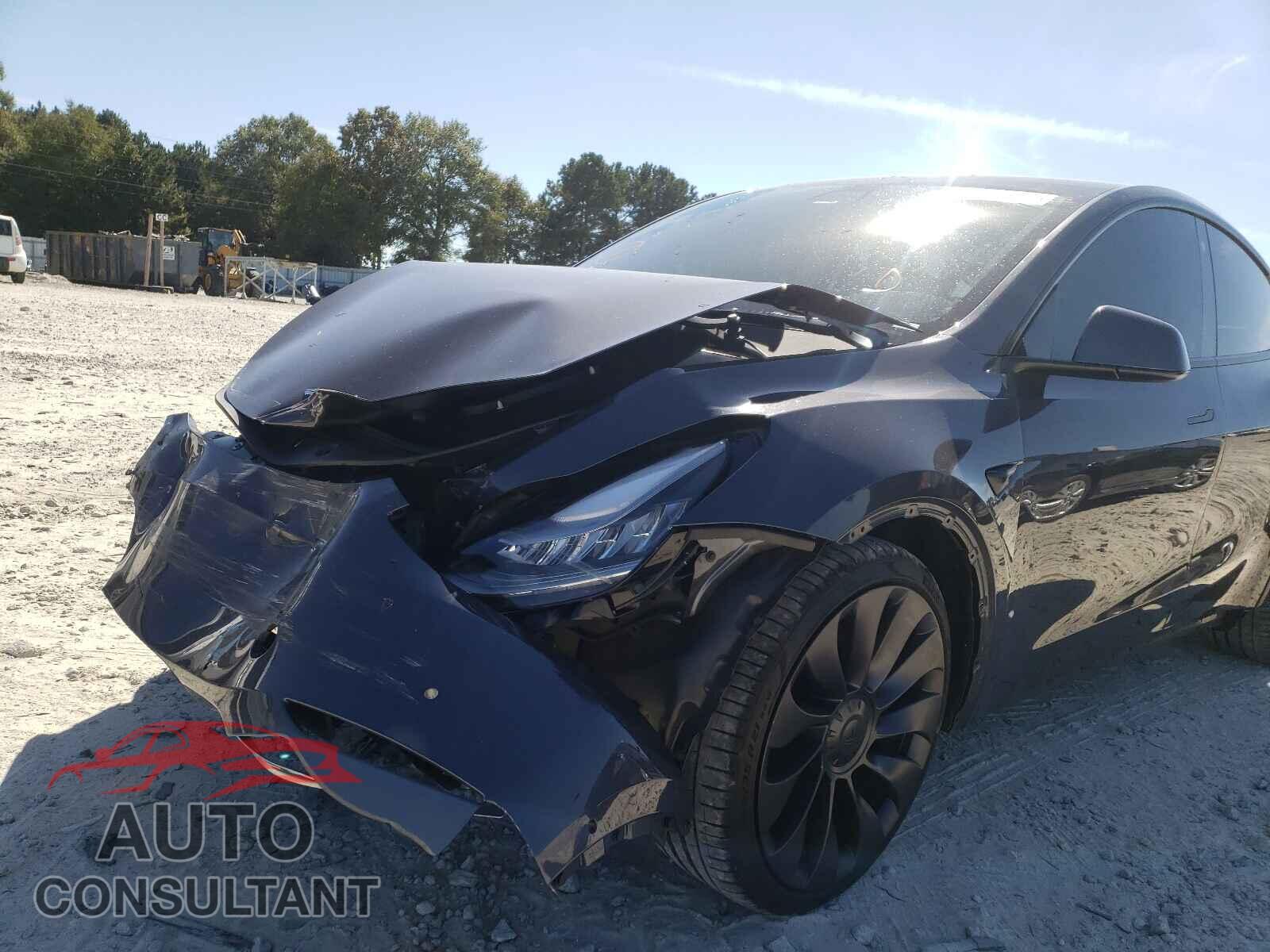 TESLA MODEL Y 2021 - 5YJYGDEF2MF081447