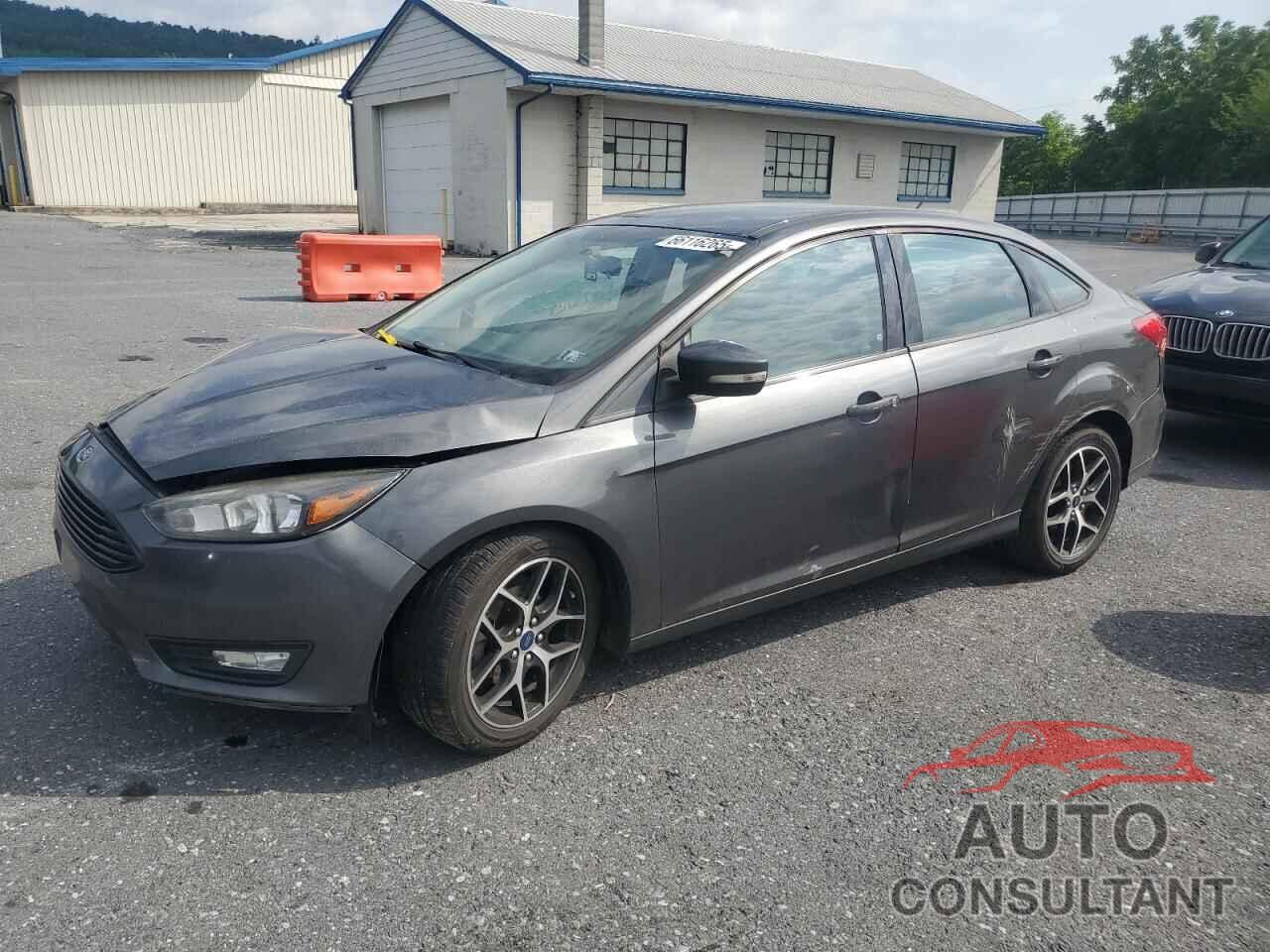 FORD FOCUS 2017 - 1FADP3FE9HL297643