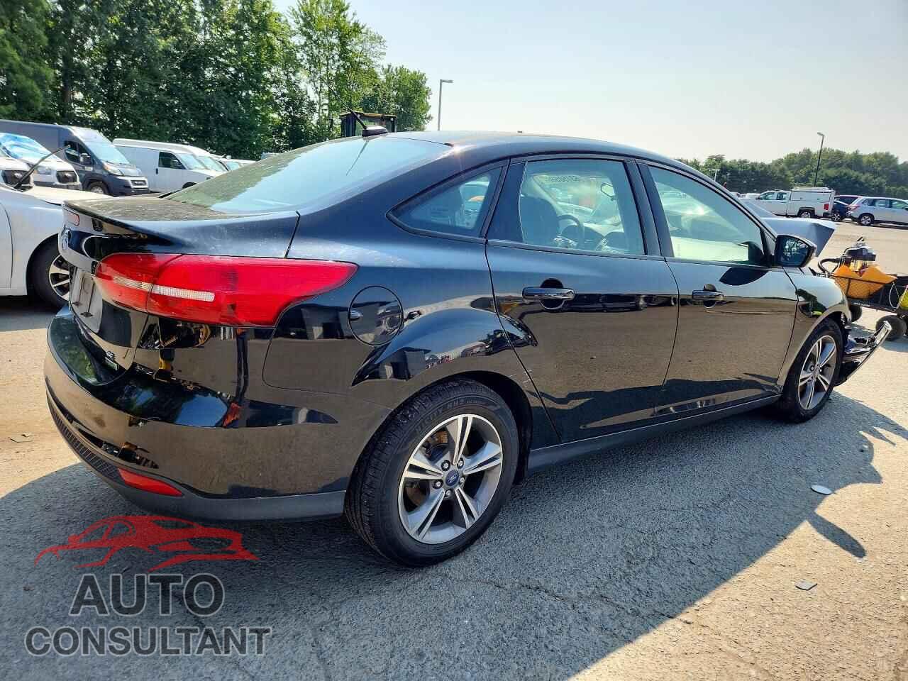FORD FOCUS 2018 - 1FADP3FE3JL200345