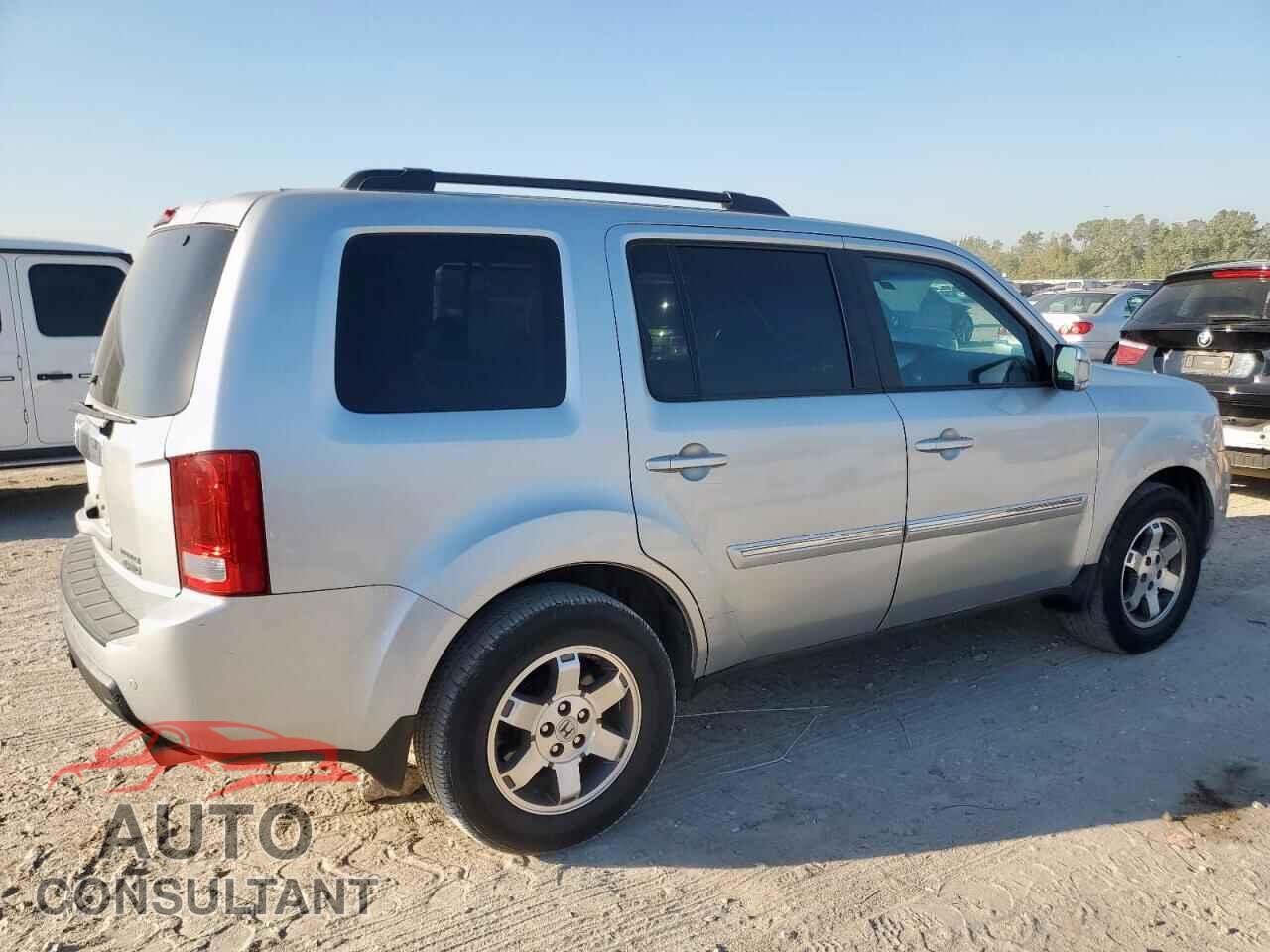 HONDA PILOT 2011 - 5FNYF4H96BB025422
