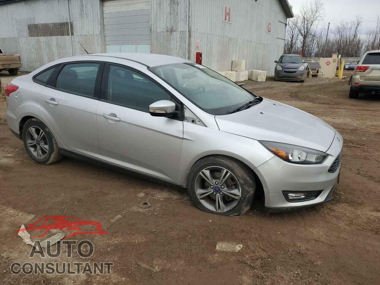 FORD FOCUS 2017 - 1FADP3FE9HL213451