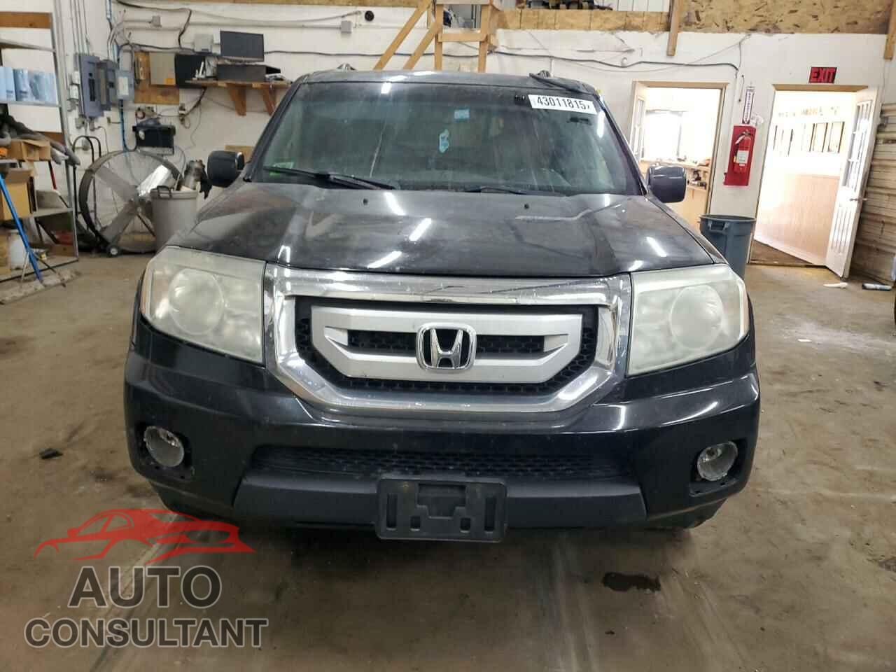 HONDA PILOT 2011 - 5FNYF4H50BB005132