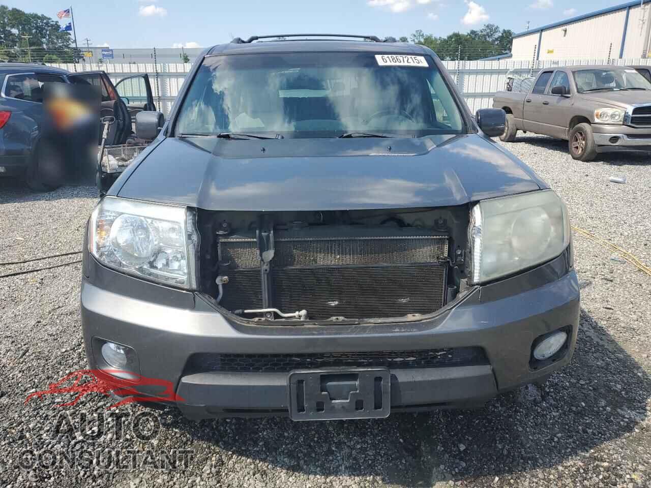 HONDA PILOT 2011 - 5FNYF4H50BB024604